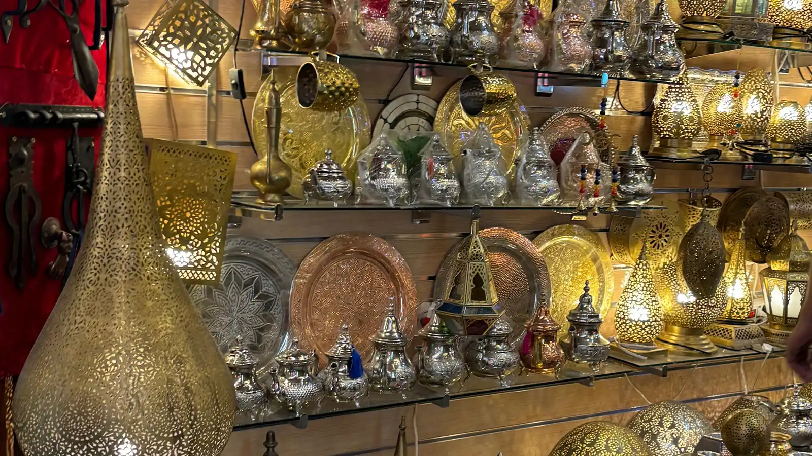 Fes souks shopping tour with golden Moroccan lamps and traditional artisan lighting