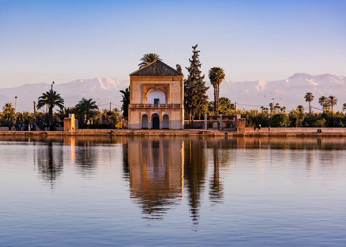 Menara Gardens pavilion and Atlas Mountains in Marrakech